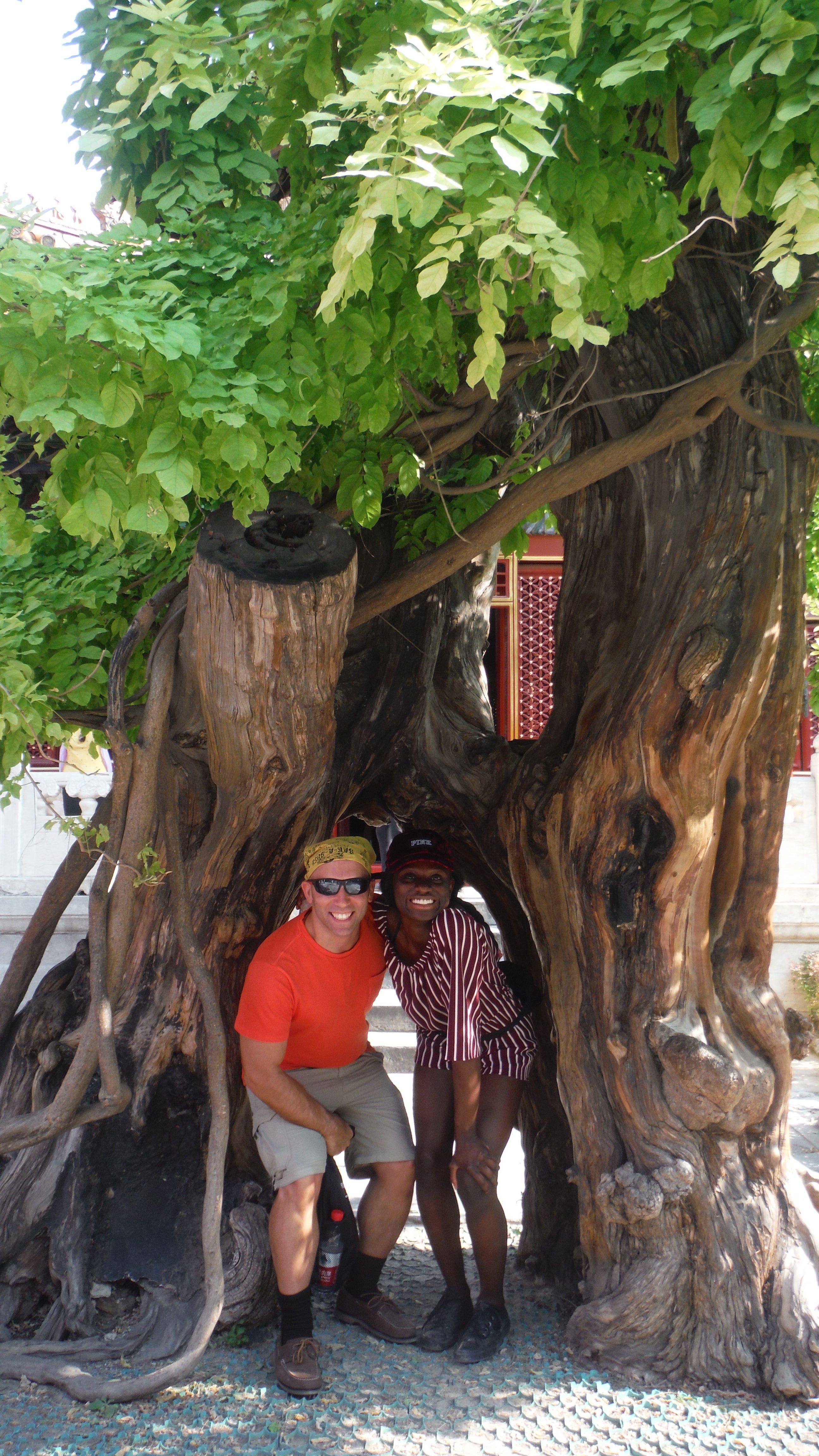 Dr. B and Student catching some shade in Beijing.