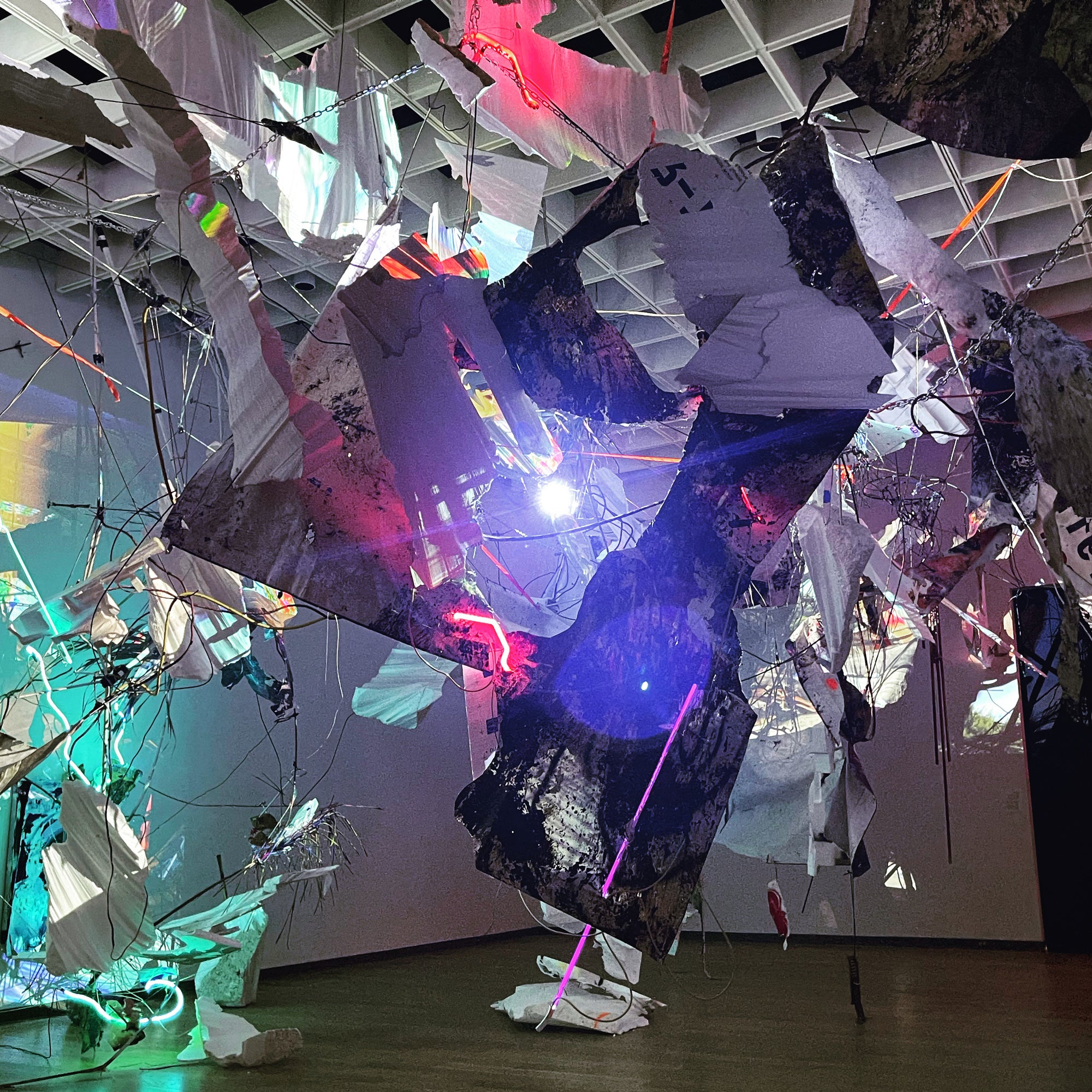 installation art made from discarded objects and video projection