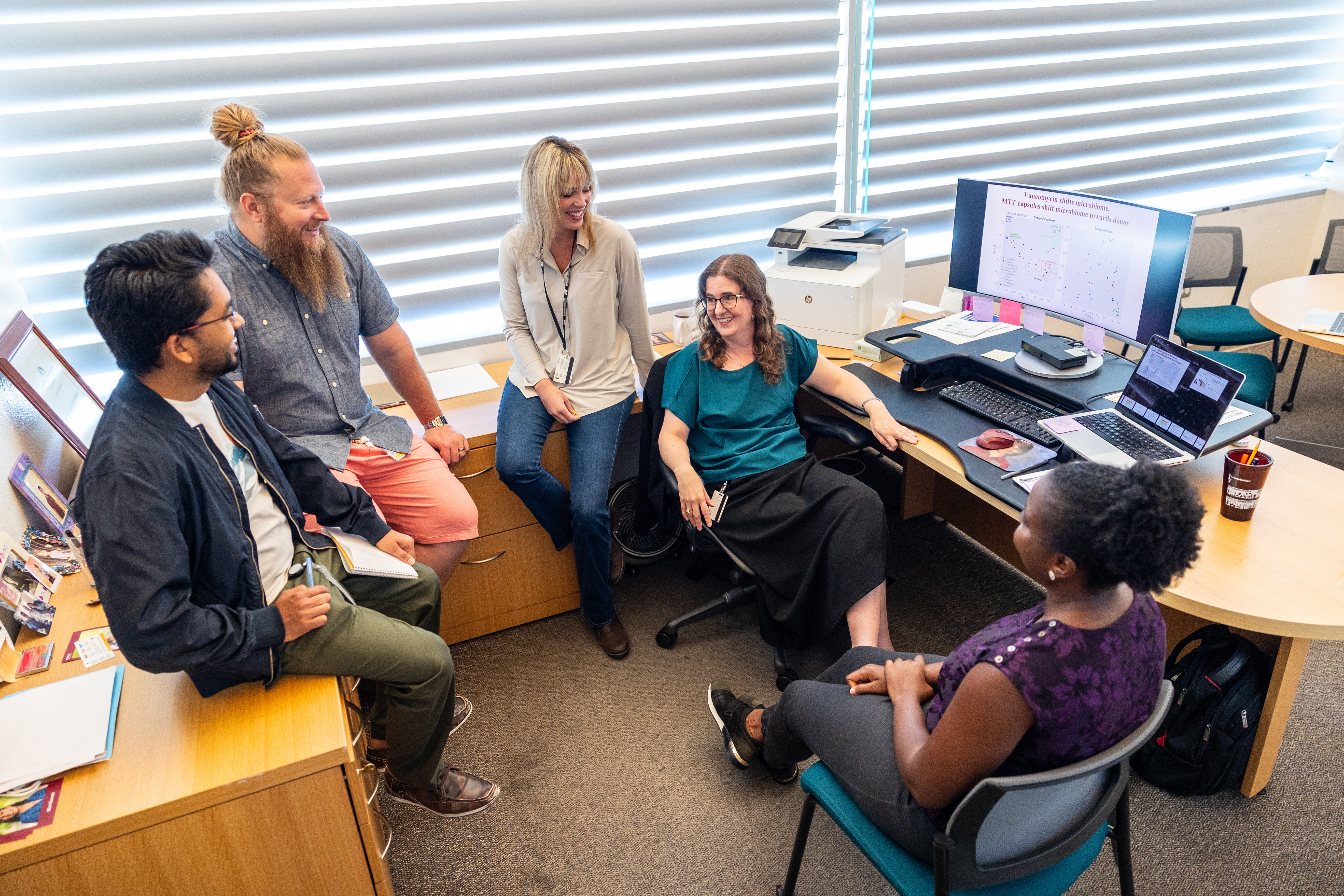 Dr. Rosa Krajmalnik-Brown with postdoctoral research scholar, Evelyn Takyi, Post-doctoral fellow Khemlal Nirmalkar, PhD student Andrew Bellinghiere, and PhD student Rylee Close