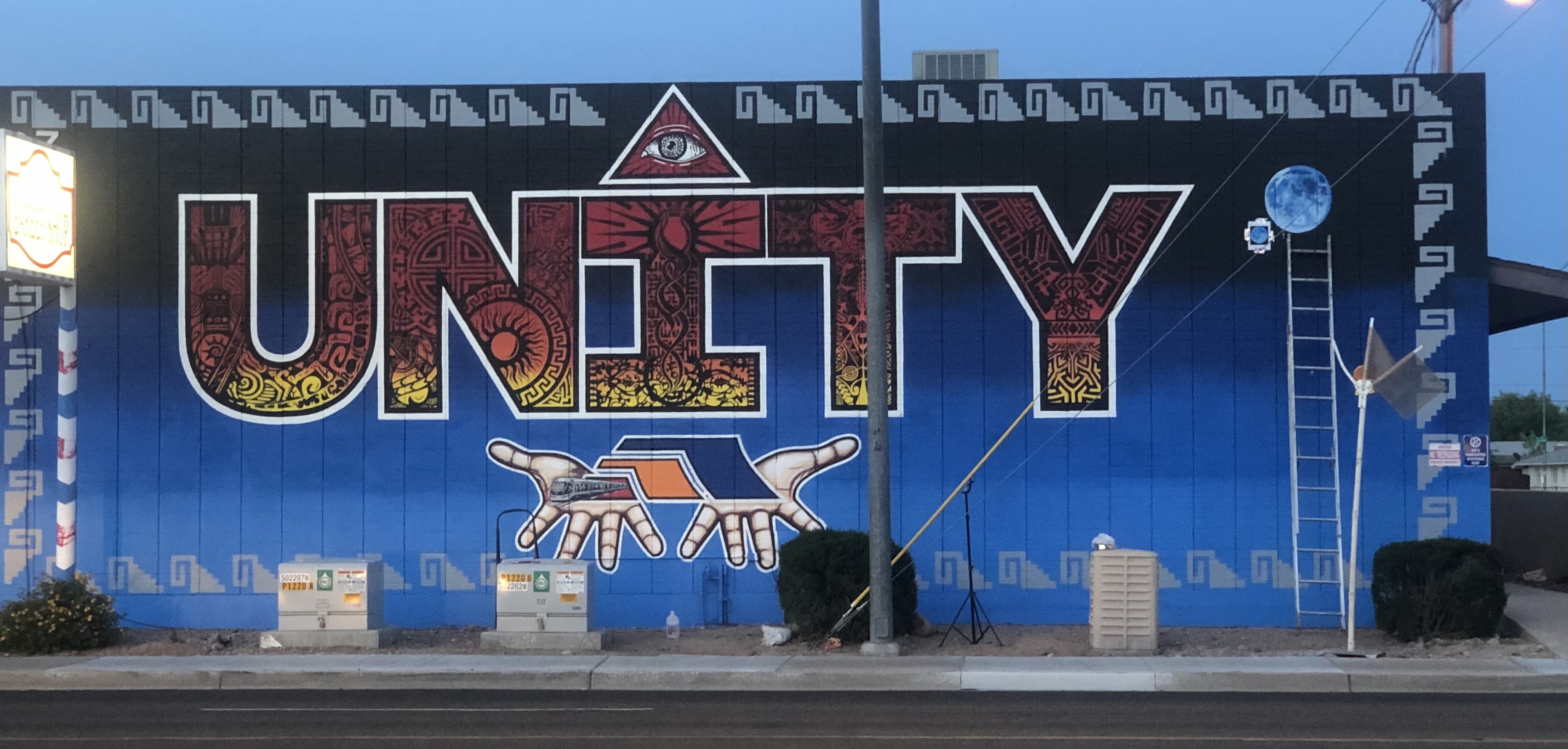 A mural I designed in 2020 and executed with a team of artists located at Stapley and Main st. Mesa, AZ