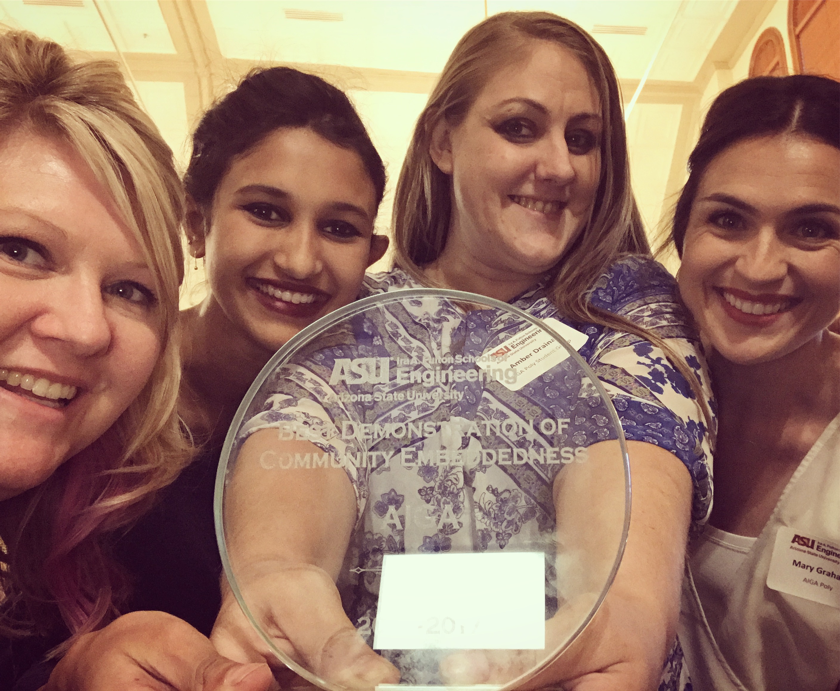 AIGA Poly winning the Social Embeddedness award in 2017