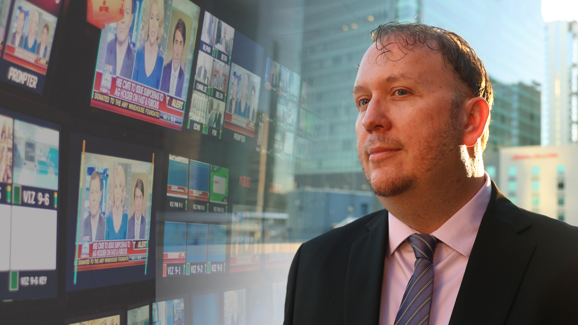 Eddie in downtown Phoenix, faded in with a tv control room