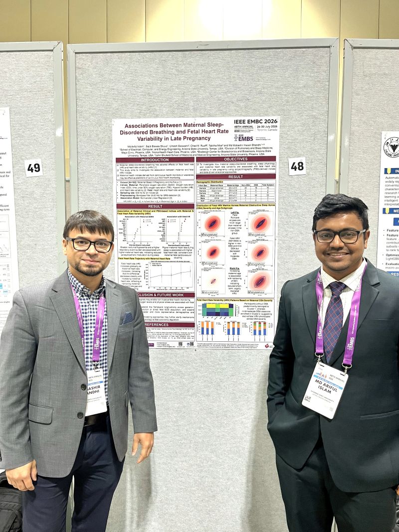 Md Ariful Islam and his PhD Advisor standing beside their research poster at the 48th Annual International Conference of the IEEE Engineering in Medicine and Biology Society (EMBC 2026) in Toronto, Canada.